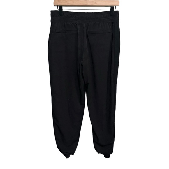 EXCELLENT CONDITION ATHLETA LINED BROOKLYN JOGGERS BLACK CAMO SIZE 4 - Picture 3 of 8